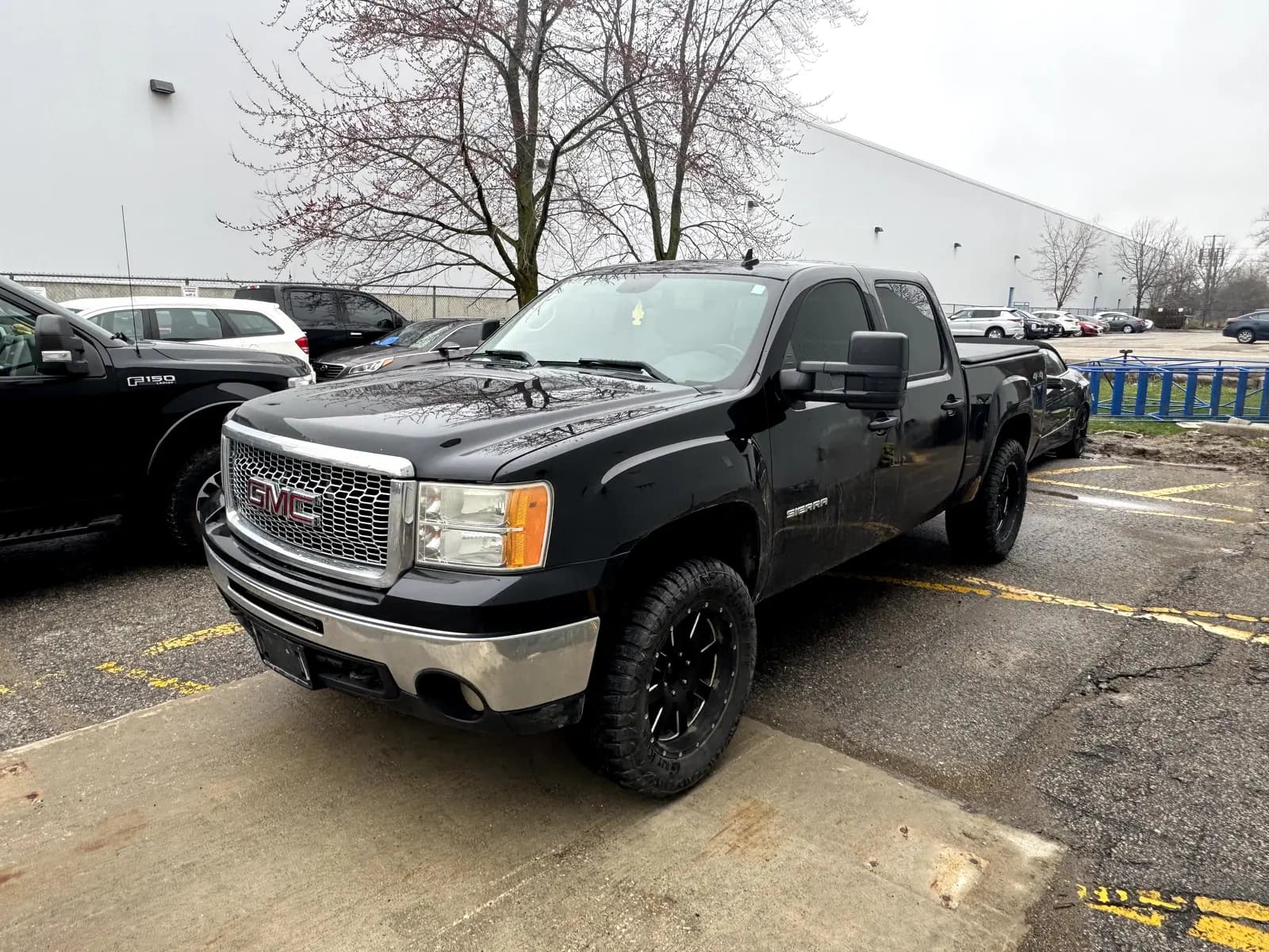 2011 GMC Sierra 1500 SLT in Black with Black interior – front exterior view 2011 GMC Sierra 1500 SLT in Black with Black interior – front exterior view