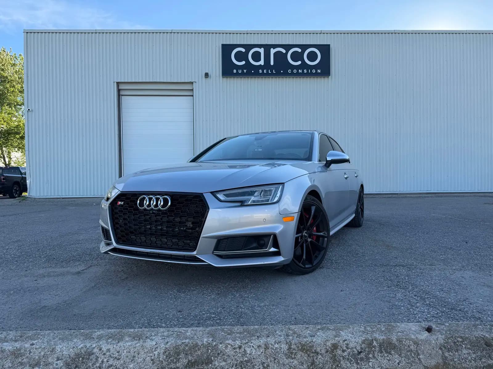 non-smoker 2018 Audi S4 Technik in Silver with Red interior – front exterior view non-smoker 2018 Audi S4 Technik in Silver with Red interior – front exterior view