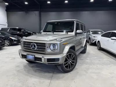 Certified, garage kept, non-smoker 2021 Mercedes-Benz G-Class G550 in Champagne with Red interior – front exterior view