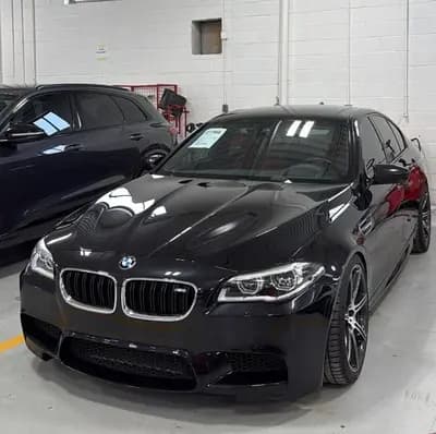 2014 BMW 5-Series M5 in Black with Red interior