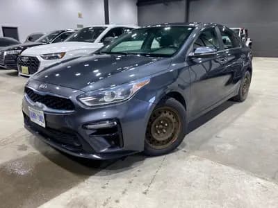 2019 Kia Forte EX Plus in Blue with Gray interior, front three quarter view