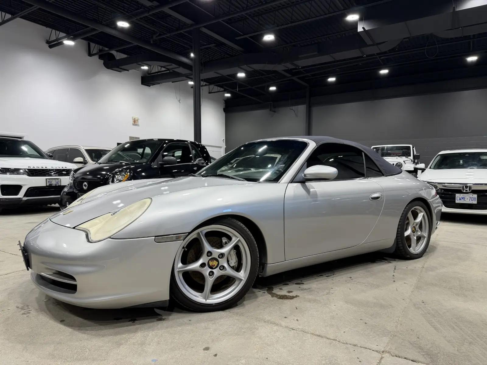 2002 Porsche 911 Carrera 4 Base, front three quarter view