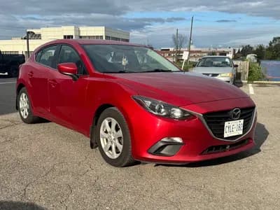 2016 Mazda Mazda3 Sport GS in Red with Black interior, front three quarter view