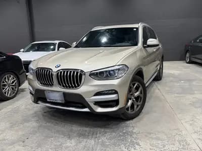 2021 BMW X3 xDrive30i in Beige with Black interior, front exterior view