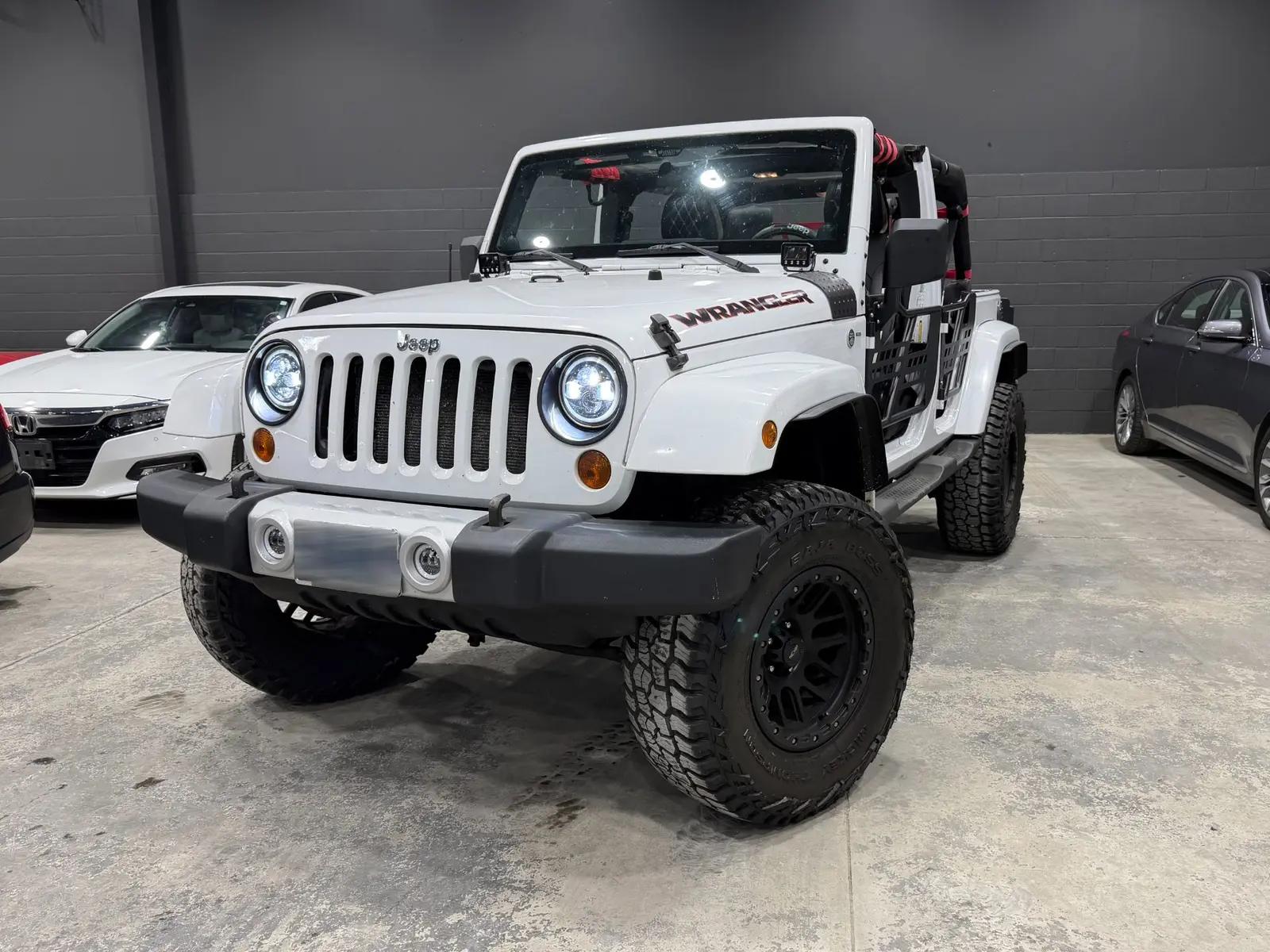 2011 Jeep Wrangler Unlimited Sahara, front exterior view
