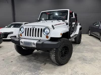 2011 Jeep Wrangler Unlimited Sahara in White with Black interior, front exterior view