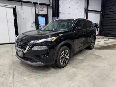 non-smoker 2021 Nissan Rogue SV in Black with Black interior, front three quarter view