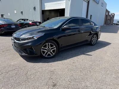 2024 Kia Forte EX in Black with Charcoal interior, front three quarter view