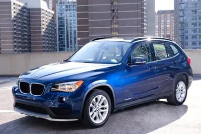 Certified 2015 BMW X1 xDrive28i in Blue with Beige interior – front exterior view