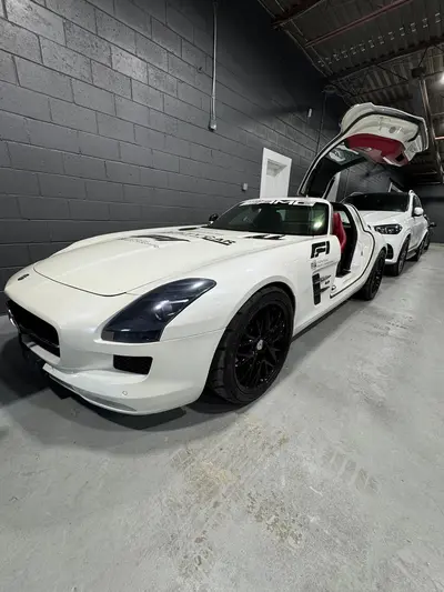 2011 Mercedes-Benz SL-Class SL63AMG in White with Red interior