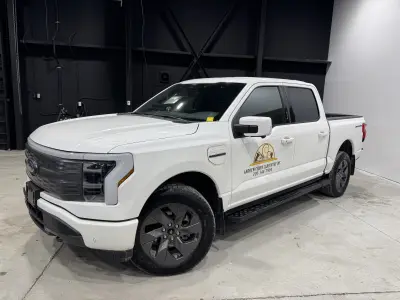 2022 Ford F150 Lightning Pro in White with Gray interior