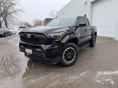 2025 Toyota Tacoma TRD Offroad Prem Hyb in Black with Black interior